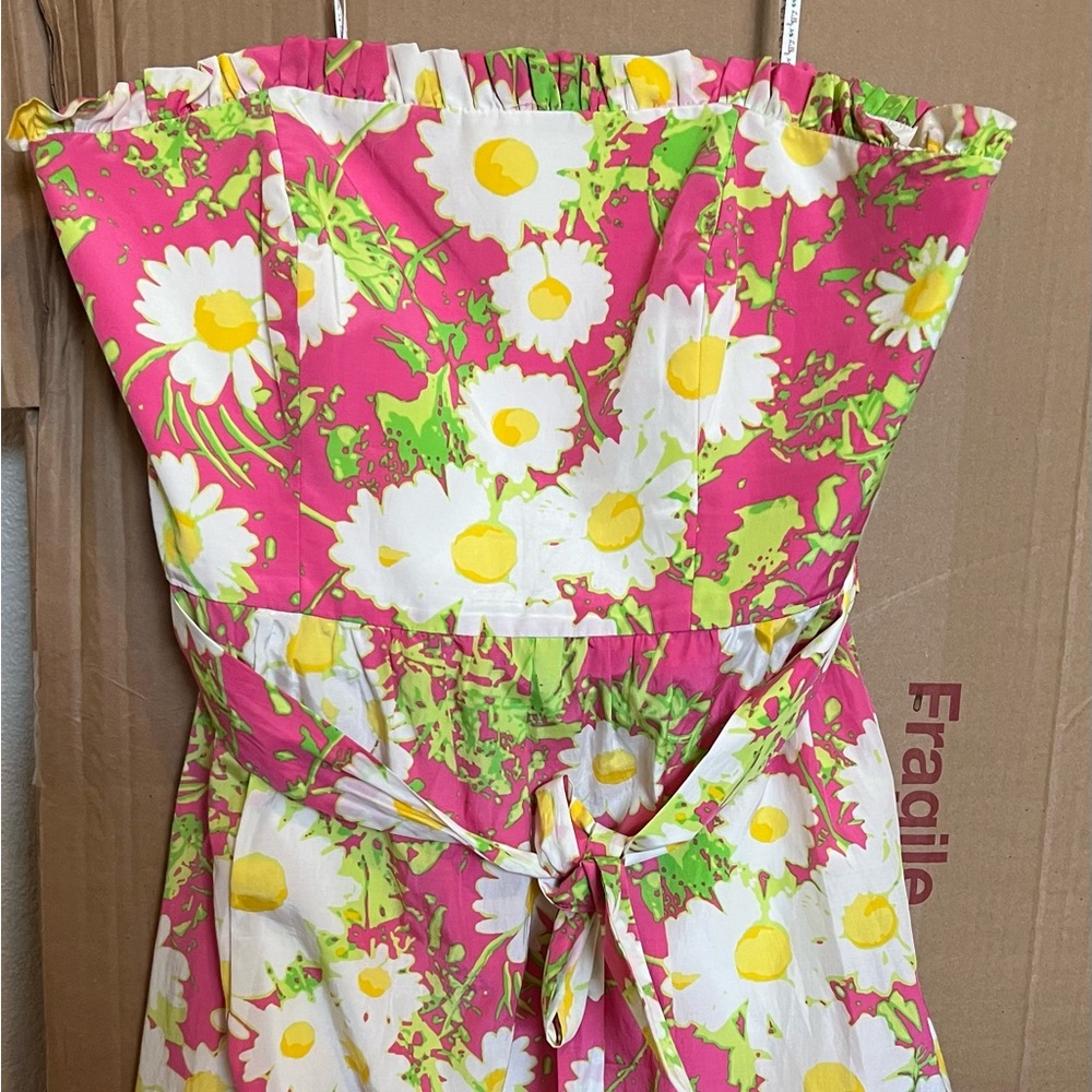 Woman’s size 14 dress with bow.